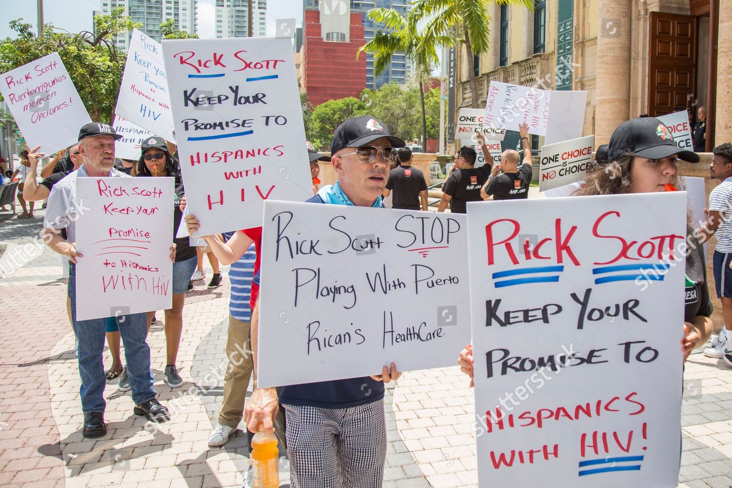 Imagen destacada para la protesta de 100 activistas contra el SIDA contra el gobernador de Florida, Rick Scott — Torre de la Libertad de Miami HOY (viernes 10 de agosto) a la 1:30 p. m.